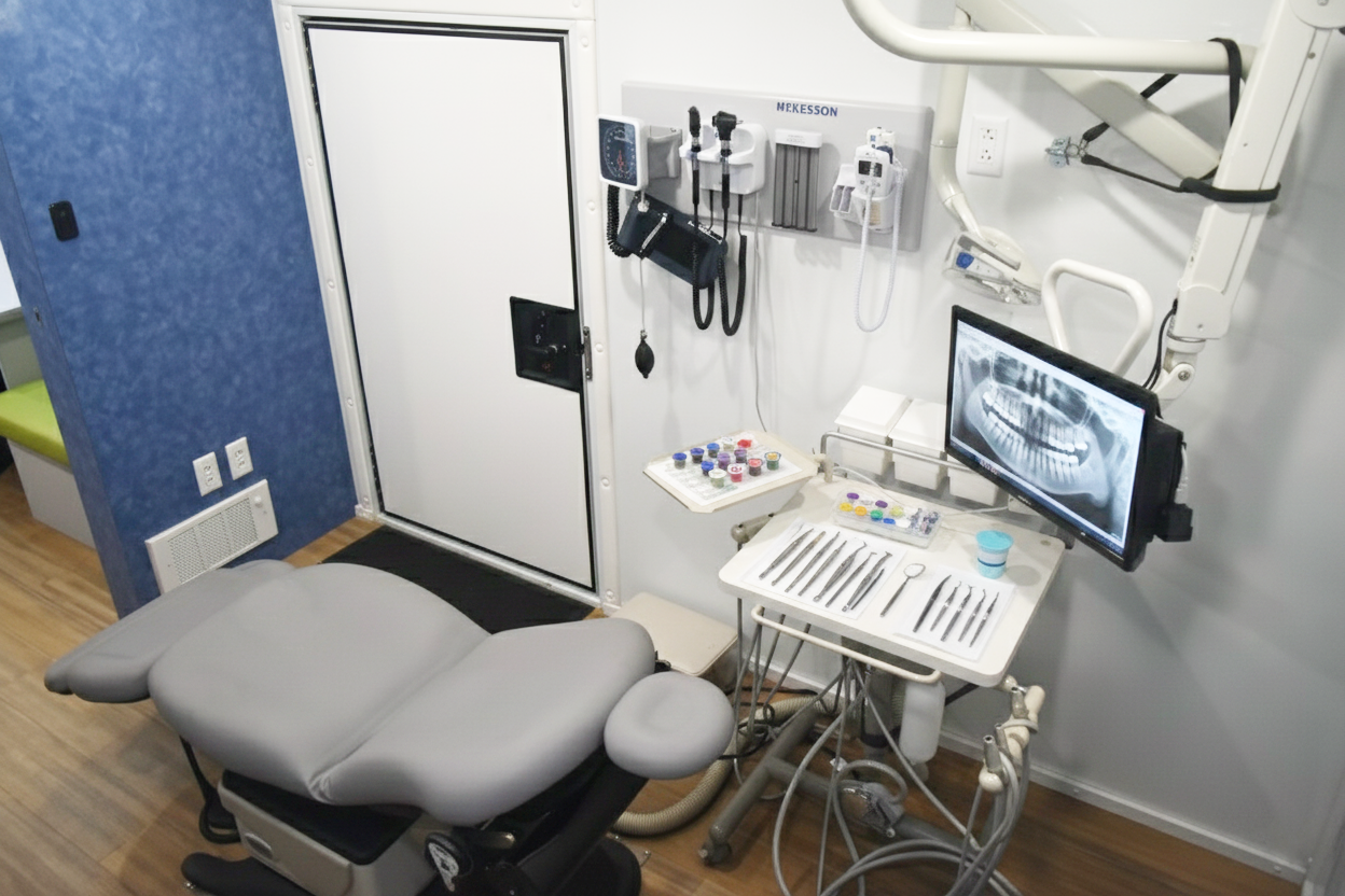 Close-up of dental instruments and fluoride/ sealant application tools inside a mobile unit.