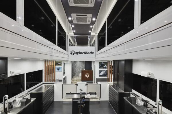 TaylorMade double-expandable experiential trailer interior