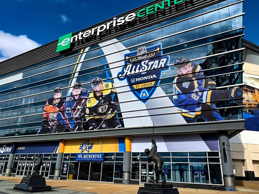 St. Louis Blues hockey team stadium graphics and signage inside the Enterprise Center arena, possibly featuring the team logo, 