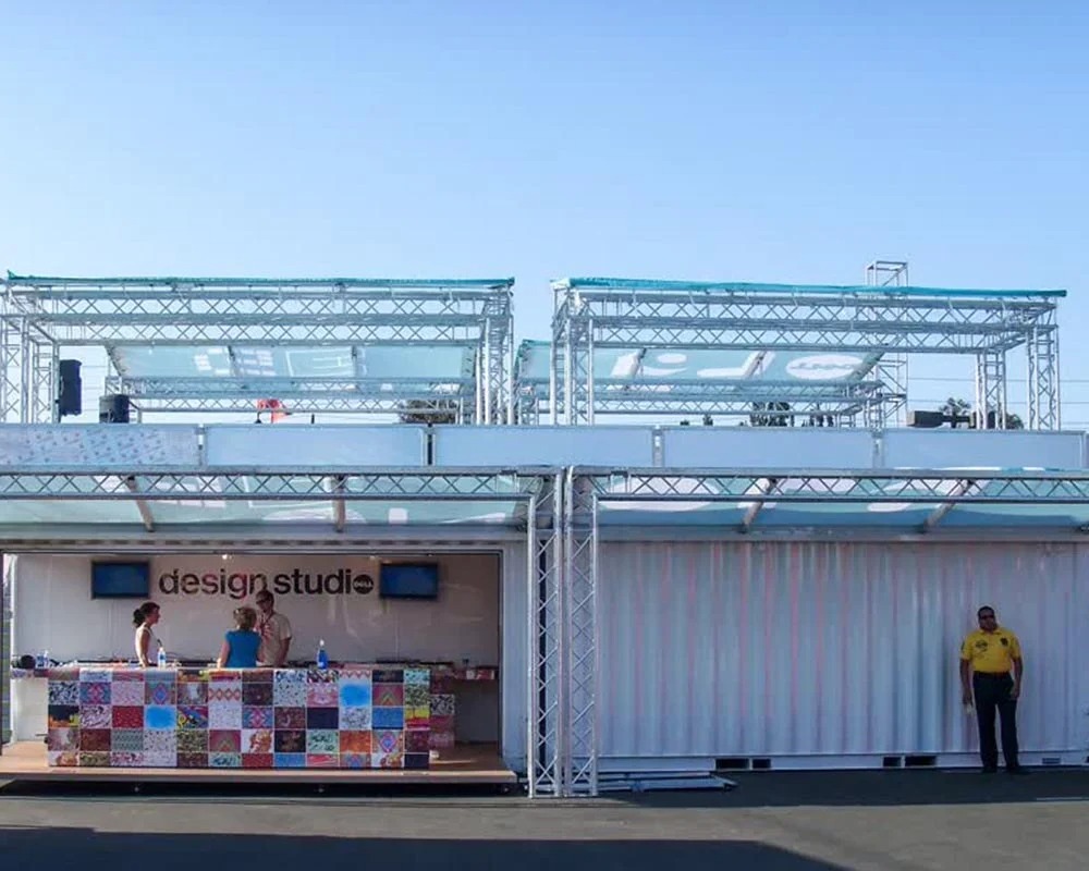 Dell Computers Design Studio built from white shipping container conversions with truss structures and a colorful counter.