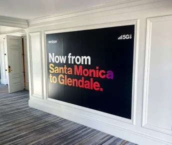 Verizon 5G wall graphic with location message,