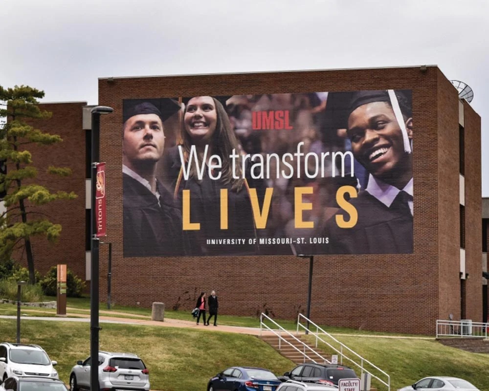 Large University of MissouriāSt. Louis (UMSL) building wrap displaying