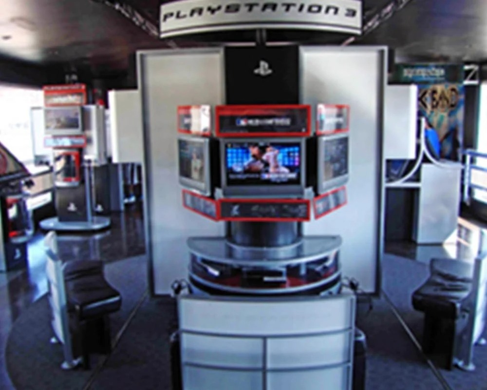 Custom PlayStation 3 mobile gaming display featuring a multi-screen demo tower for multiple players.