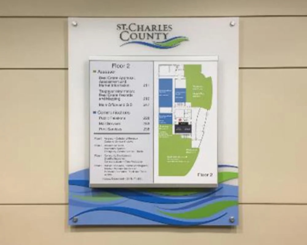 Acrylic interior wayfinding sign with building map and directory for St. Charles County government office or facility.