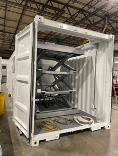Significant container modification with complex equipment integration on forklift deployable platforms2