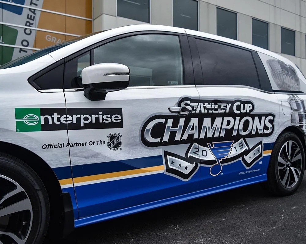 White Enterprise vehicle wrap celebrating the St. Louis Blues 2019 Stanley Cup Champions win.