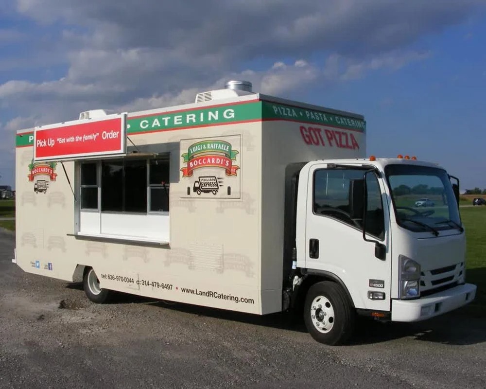 Boccardi's Express white catering and pizza custom food truck with green and red accents, built by custom food truck builders.