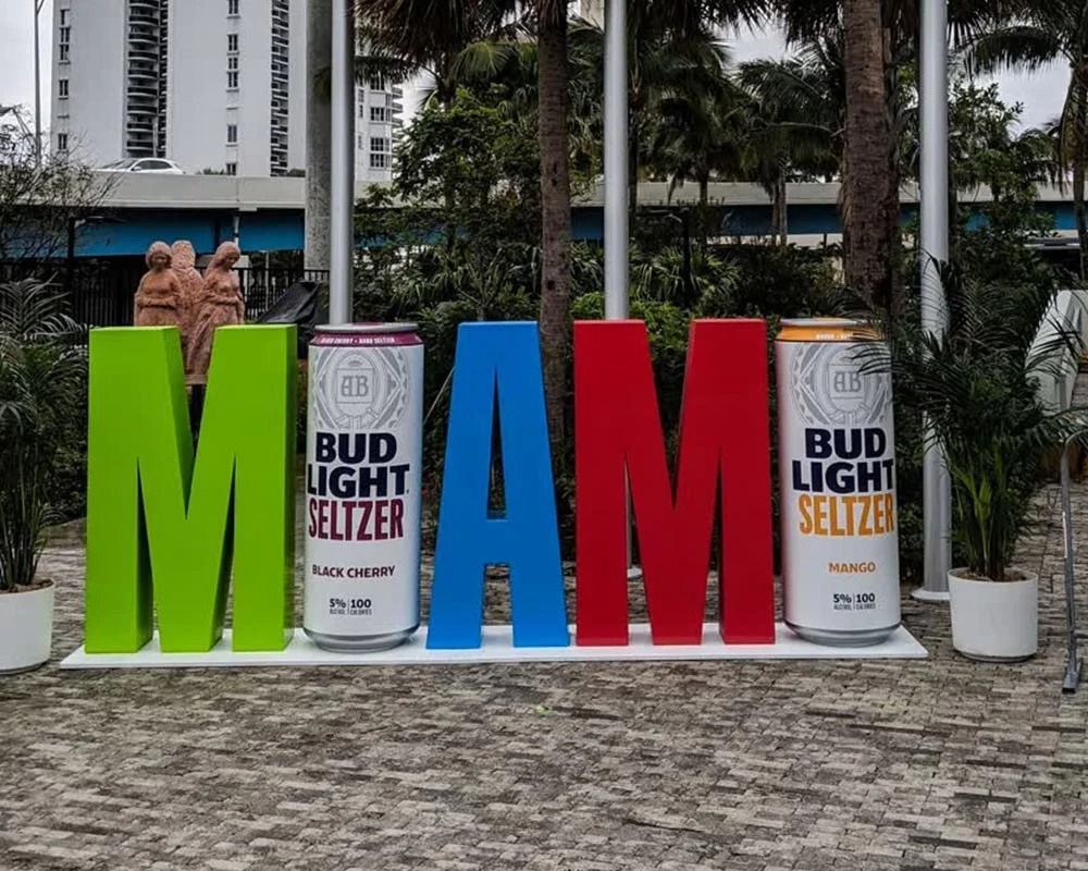 Bud Light Seltzer cans integrated into a colorful