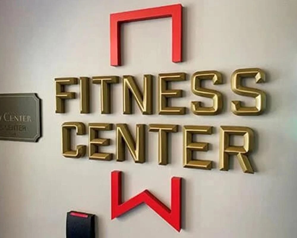Interior gold dimensional letters spelling